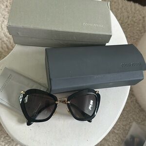 Miu Miu black cat eye sunglasses gold arms gradient lens